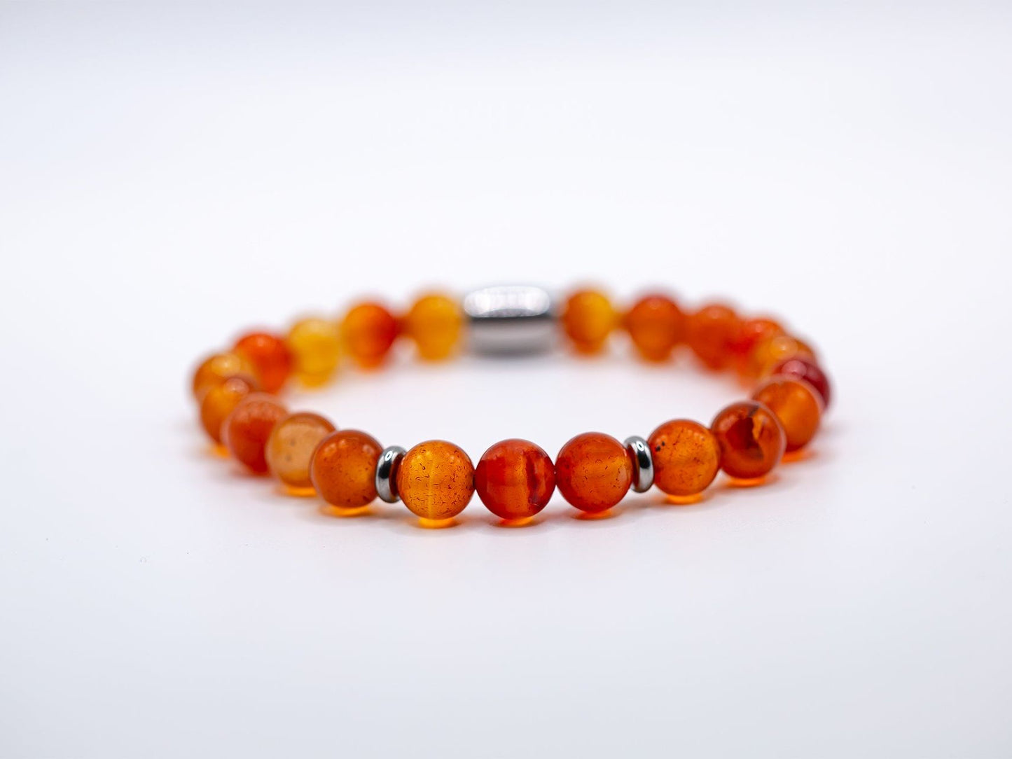 Ashur Designs Sobek natural carnelian agate handmade bracelet, 8mm white background rule of three stones.