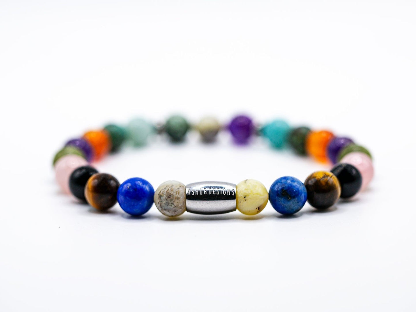 Ashur Designs Pantheon bracelet with a mix of natural gemstones. White background