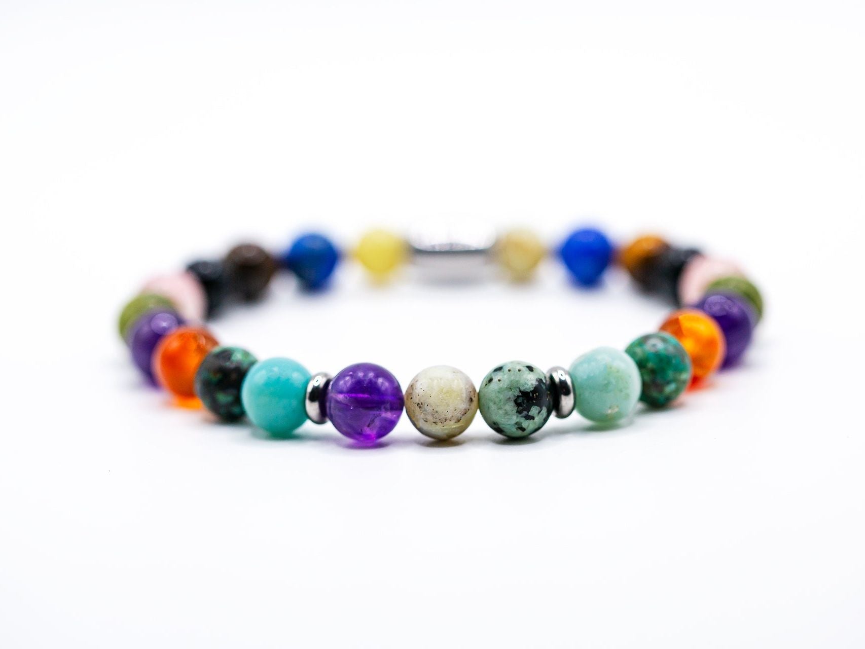 Ashur Designs Pantheon bracelet with a mix of natural gemstones. Rule of Three stones